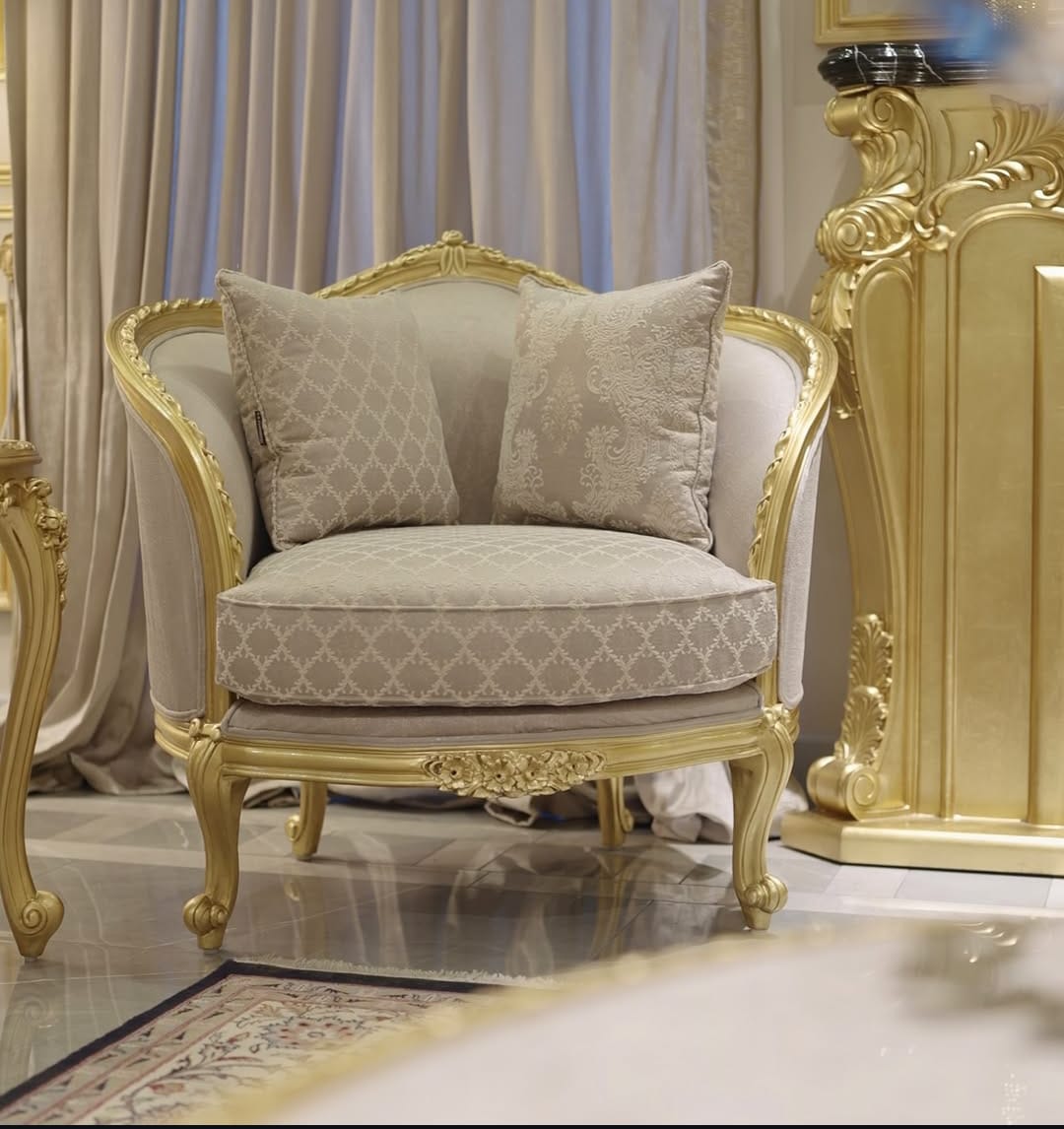Luxury single seater sofa chair design in Pakistan with price, featuring white fabric and gold carved frame
