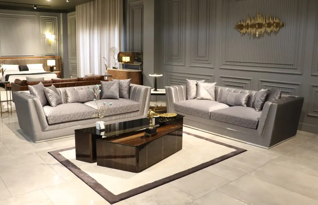 modern luxury sofa set design in Pakistan with grey fabric sofas and wooden center table in elegant living room