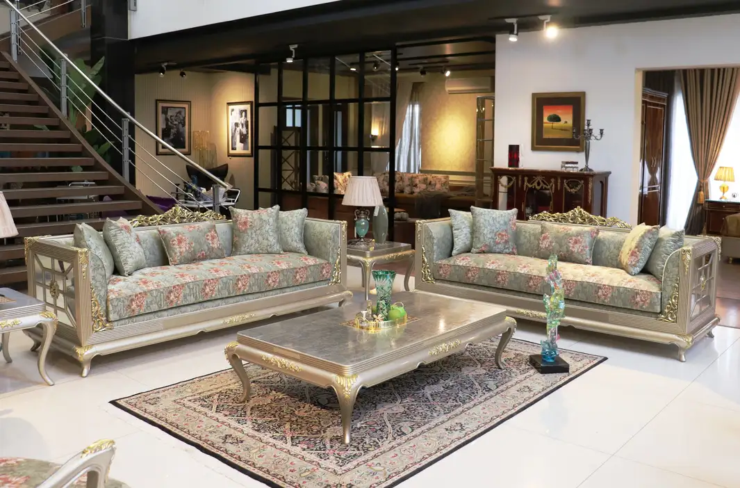 luxury classic sofa set design in Pakistan with carved wooden frame and elegant drawing room interior