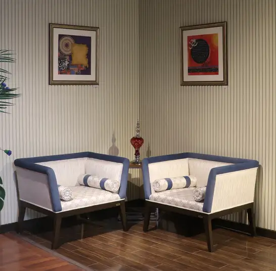 modern single seater accent chair design in Pakistan with wooden legs for living room corner seating