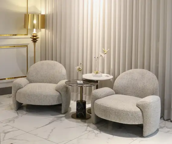 modern single seater lounge chair design in Pakistan with fabric accent chairs and side table