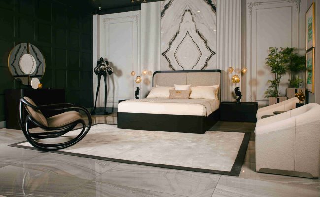 Modern luxury bedroom set with elegant bed, armchairs, and decor by NM Furnisher showcasing luxury furniture in Pakistan